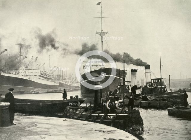"Into the Arena Where Ships Made Their Unending Entrances and Exits" A Vessel Docking at...', 1937. Creator: Fox.