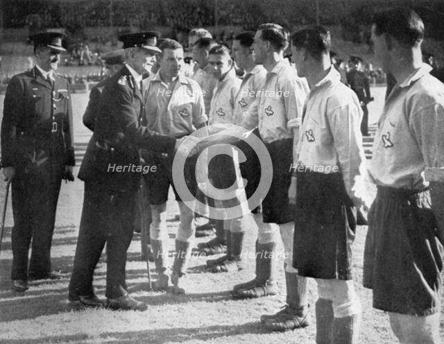 Introductions before a RAF vs Metropolitan Police football match, Wembley, London, 1942. Artist: Unknown