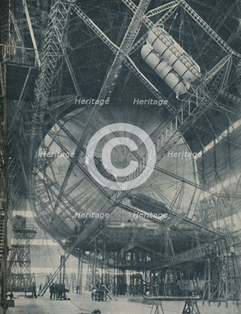 'Intricacies of Framework and Cylinder: R101 in the Making', c1935. Artist: Unknown.