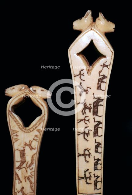Inuit arrowshaft straightener. Artist: Unknown