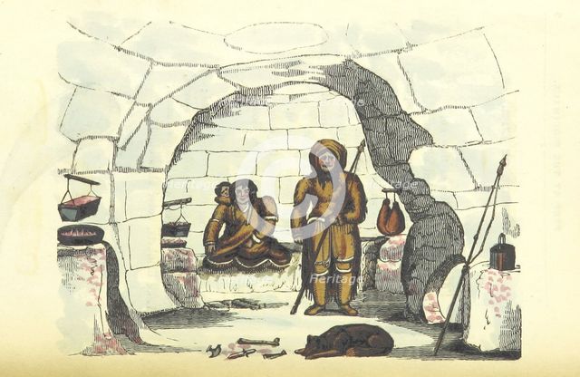 Inuit family in their igloo, 1825.  Creator: Unknown.