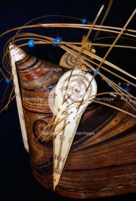 Inuit Wood hunting cap with ivory ornament collected during Cooks 3rd voyage, 1776-1780. Artist: Unknown.