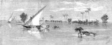 Inundation of the Nile: view below Kafr Zayat, showing the railway-bridge, and train off..., 1861. Creator: Richard Principal Leitch