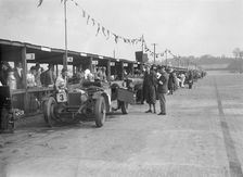 Invicta of FH Cairnes and George Field in the pits at the JCC Double Twelve race, Brooklands, 1931. Artist: Bill Brunell