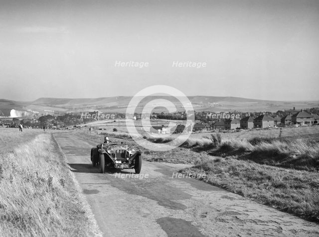 Invicta S Type Red Gauntlet of D Monro at the Bugatti Owners Club Lewes Speed Trials, Sussex, 1937. Artist: Bill Brunell.
