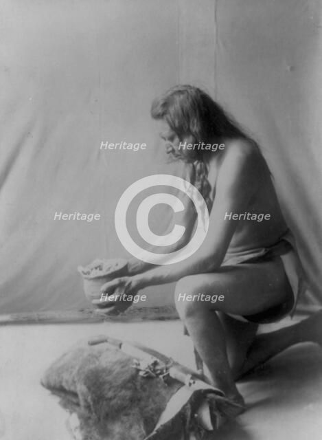 Incense over a medicine bundle, c1908. Creator: Edward Sheriff Curtis.