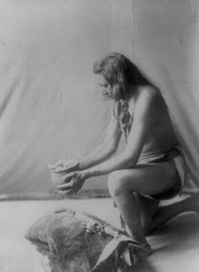 Incense over a medicine bundle, c1908. Creator: Edward Sheriff Curtis
