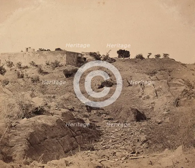 India: the ruins of Sammy House surrounded by scattered bones of sepoys killed in action, c1858. Creator: Felice Beato.
