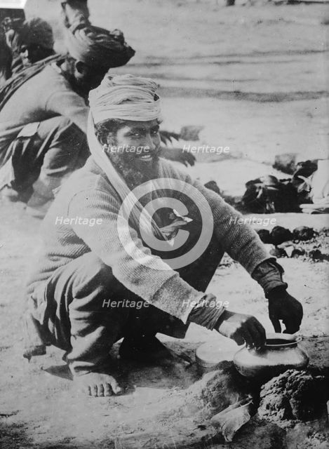 Indian soldier cooking, in France, between c1914 and c1915. Creator: Bain News Service.