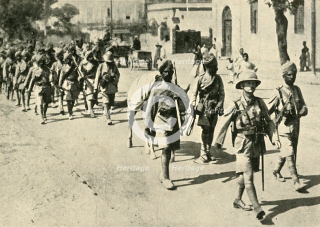 Indian soldiers and British officer, First World War, 1914-1918, (c1920). Creator: Unknown.
