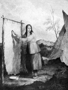 Indian Woman Dressing a Deer Skin 1868.Artist: Seth Eastman