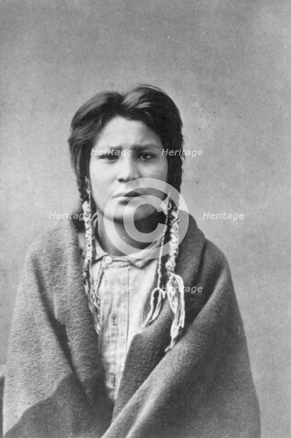 Indian youth in Indian costume, Hampton, Va., (1899 or 1900?). Creator: Frances Benjamin Johnston.