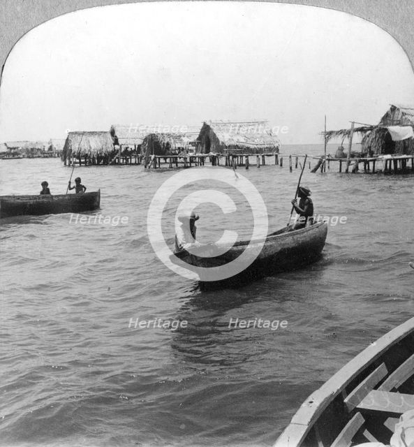 Indians in log canoes, Lake Maracaibo, Venezuela, c1900s. Artist: Unknown