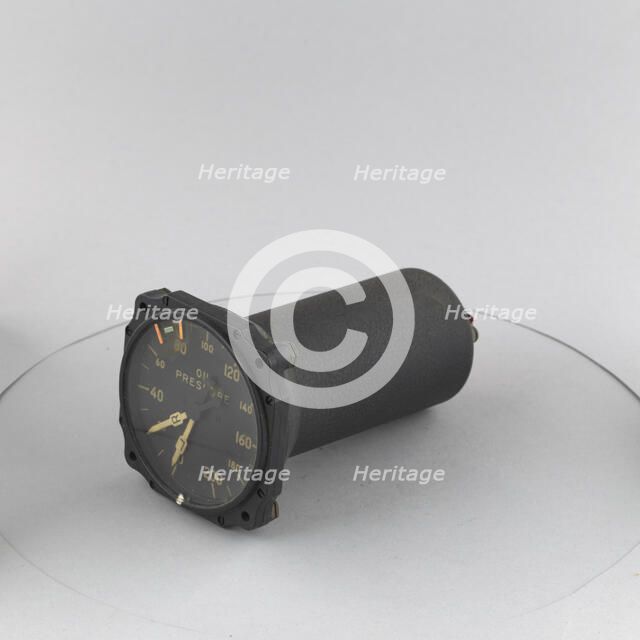 Indicator, Autosyn, Dual, Oil Pressure, B-9, B-9A. Creators: Bendix Aviation, Pioneer Instrument Company.