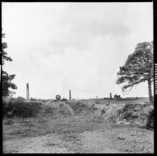 Industrial landscape with abandoned mine engine houses and chimneys, Tamar Valley, Cornwall, 1967. Creator: Eileen Deste