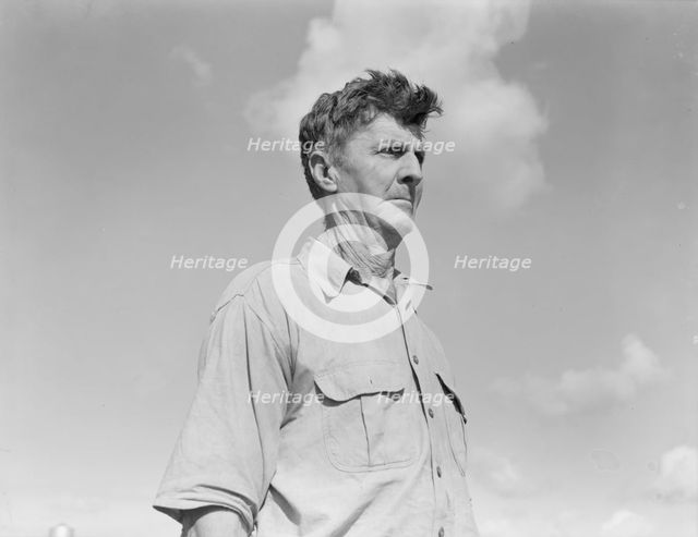 Industrialized agriculture, from Texas farmer to migratory worker in California, Kern County, 1938. Creator: Dorothea Lange.