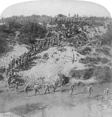 Infantry fording the Vet River during Lord Roberts advance on Pretoria, South Africa, 1901.Artist: Underwood & Underwood