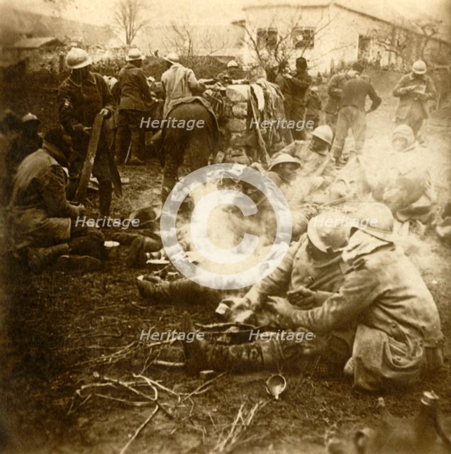 Infantrymen at makeshift kitchen, Cussy farm, Craonne, northern France, c1914-c1918. Artist: Unknown.