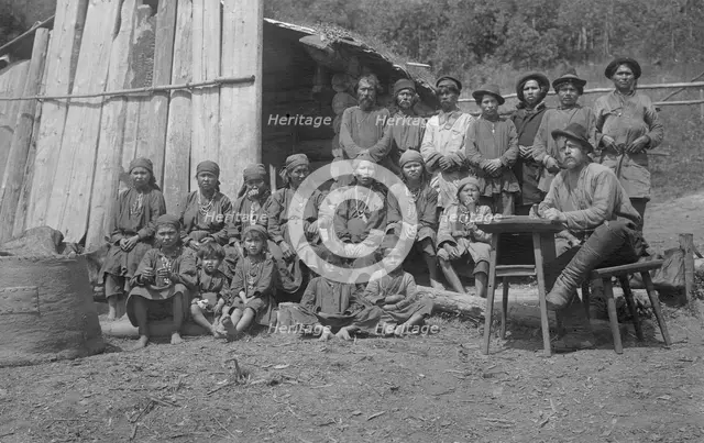 Inhabitants of One Gornaia Shoria Village and an Expedition Member, 1913. Creator: GI Ivanov.