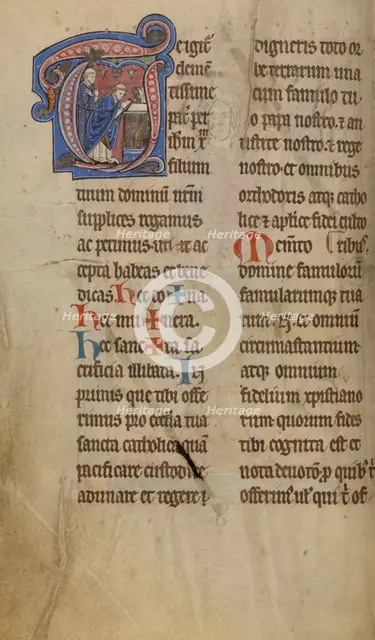 Initial T: A Priest Celebrating Mass; Missal, begun after 1234-completed before 1262. Creator: Unknown.