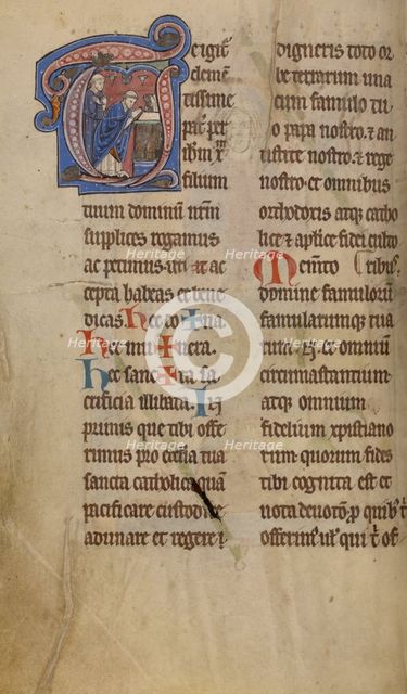Initial T: A Priest Celebrating Mass; Missal, begun after 1234-completed before 1262. Creator: Unknown.