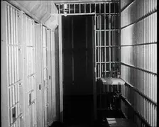 Inside of an American Prison, Corridor and Cells, 1930s. Creator: British Pathe Ltd