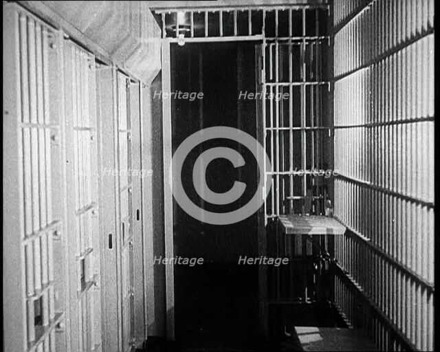 Inside of an American Prison, Corridor and Cells, 1930s. Creator: British Pathe Ltd.