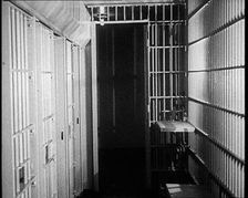 Inside of an American Prison, Corridor and Cells, 1930s. Creator: British Pathe Ltd