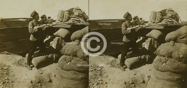 Inside a Russian fort during the siege - shell marks around a dummy gun - Port Arthur, c1905. Creator: Underwood & Underwood.