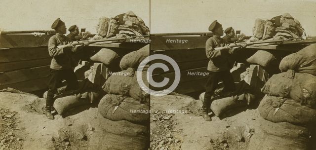 Inside a Russian fort during the siege - shell marks around a dummy gun - Port Arthur, c1905. Creator: Underwood & Underwood.