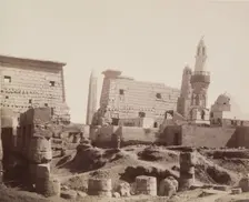 Inside First Court with Mosque of Abu Haggag, Temple of Luxor, Looking North., 19th century. Creator: Anon