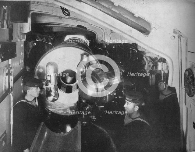 'Inside the Barbette of a Battleship showing the opened breech of a 13'5 inch gun', 1914. Artist: Unknown.