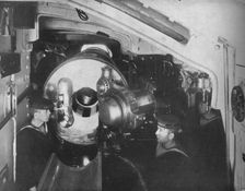 Inside the Barbette of a Battleship showing the opened breech of a 13'5 inch gun 1914