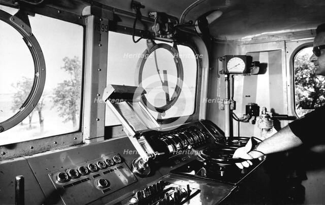 Inside the cab of an electric locomotive, 1950.