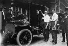 Inspector Walsh condemning taxicab, 1913. Creator: Bain News Service