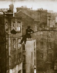 Inspecting a telephone cable between Conduit and Maddox Streets, 20th century