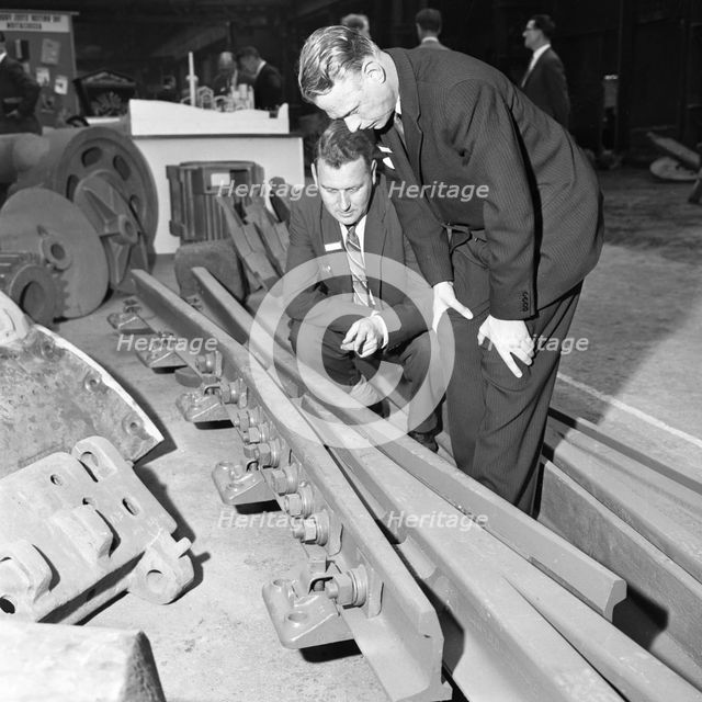 Inspecting a tram junction made at the Edgar Allen Steel Foundry, Meadowhall, Sheffield, 1962. Creator: Michael Walters.