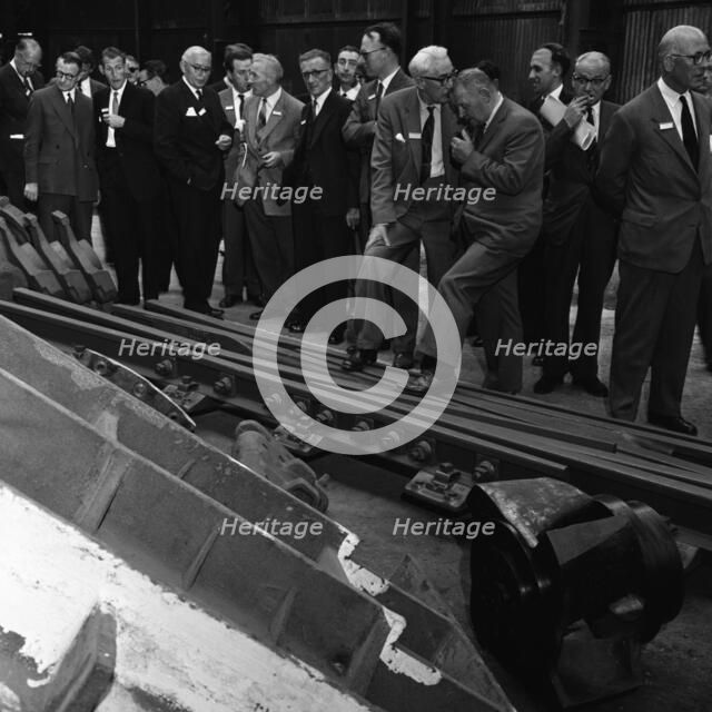 Inspecting a tram junction, made at the Edgar Allen Steel Foundry, Meadowhall, Sheffield, 1962. Artist: Michael Walters