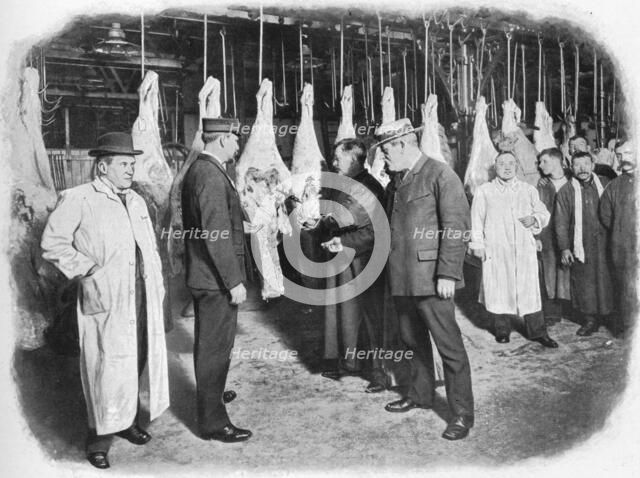 Inspecting meat at Smithfield Market, City of London, c1903 (1903). Artist: Unknown.
