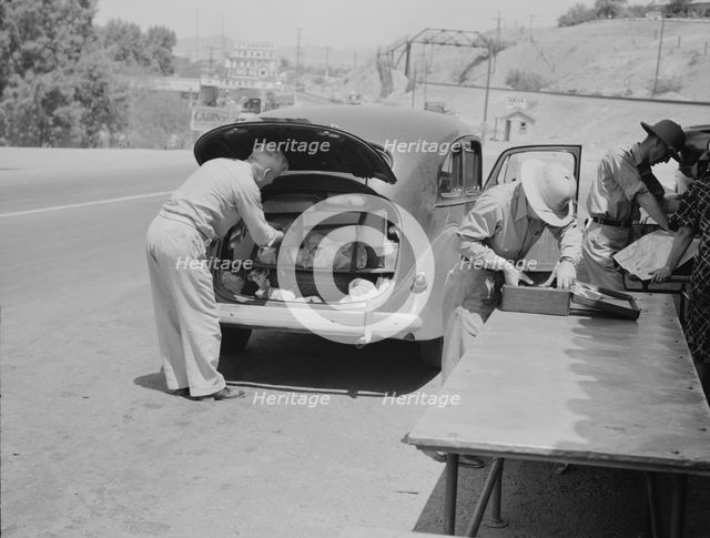 Inspection station on the California-Arizona state line maintained by..., 1937. Creator: Dorothea Lange.