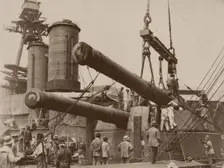 Installation of a gun in the Japanese battleship Hyuga at the Mitsubishi Nagasaki Shipyard, 1917-18. Creator: Anonymous