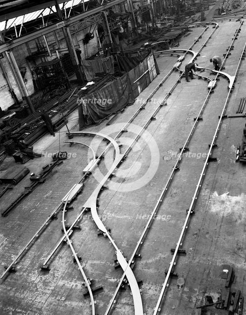Installation of trackwork in an ICI Plant, Sheffield, South Yorkshire, 1963. Creator: Michael Walters.