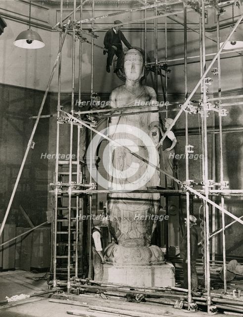 Installing the Amitabha Buddha in the Central Hall, 1935.  Creator: Topical Press Agency.