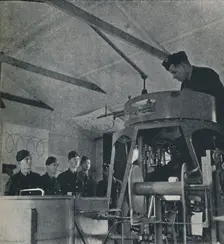 Instruction for air gunners 1941. Artist: Cecil Beaton