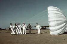 Instructor explaining the operation of a parachute to student pilots, Fort Worth, Tex., 1942. Creator: Arthur Rothstein