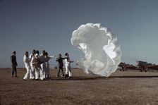 Instructor explaining the operation of a parachute to student pilots, Fort Worth, Tex., 1942. Creator: Arthur Rothstein