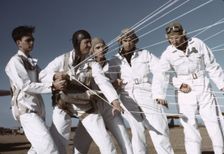 Instructor explaining the operation of a parachute to student pilots, Fort Worth, Tex., 1942. Creator: Arthur Rothstein