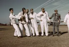 Instructor explaining the operation of the parachute to students, Fort Worth, Tex., 1942. Creator: Arthur Rothstein