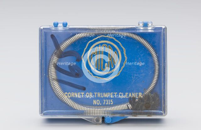 Instrument cleaning snake and case belonging to Maxine Sullivan, ca. 1936. Creator: Unknown.