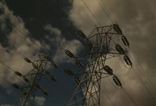 Insulators and transmission wires in the switchyard of the TVA's Chickamauga Dam..., Tennessee, 1942 Creator: Alfred T Palmer